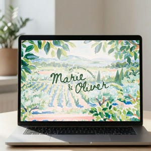 May include: A laptop screen displaying a watercolour-style landscape illustration of a vineyard with green trees in the foreground. The text "WE'RE GETTING MARRIED" appears in a small arc above the names "Marie & Oliver" written in dark green.