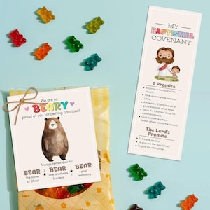 May include: A yellow bag of gummy bears with a card that says "We are so BEARY proud of you for getting baptized!" and a brown bear illustration. The card also has a list of things to remember: "BEAR the name of Christ", "BEAR one another's burdens", and "BEAR your testimony".