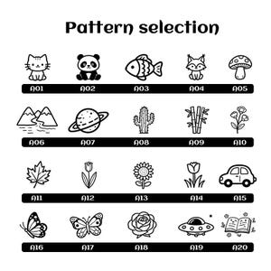 May include: A black and white illustration titled "Pattern selection" featuring 20 different designs. The designs include a cat, panda, fish, fox, mushroom, mountains, planet, cactus, bamboo, flower, leaf, tulip, sunflower, car, butterflies, rose, UFO, and book.