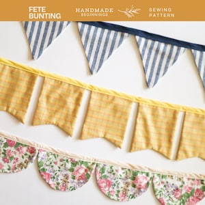 May include: Three rows of decorative bunting in various patterns. The top row features blue and white striped triangles. The middle row has yellow plaid rectangles. The bottom row displays a floral pattern with pink roses. Text at the top reads "FETE BUNTING", "HANDMADE BEGINNINGS", and "SEWING PATTERN".