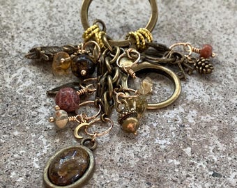 Knitters necklace. Stitchmarkers & progresskeepers. Personalized. Necklace or keychain/bagjewelry.