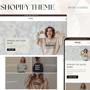 Könnte beinhalten: Beige Classic Shopify-Theme-Website mit einem Model, das ein beiges Sweatshirt mit dem aufgedruckten Wort "Jesus" trägt. Die Website bietet eine Auswahl an Sweatshirts mit verschiedenen Designs, darunter "surrender", "come come" und "Jesus".