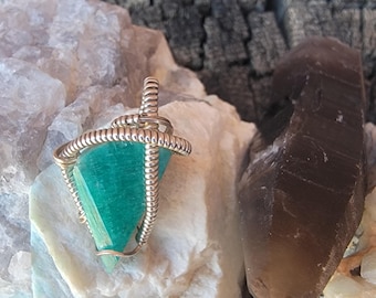 Amazonite crystal pendant wrapped in sterling silver.