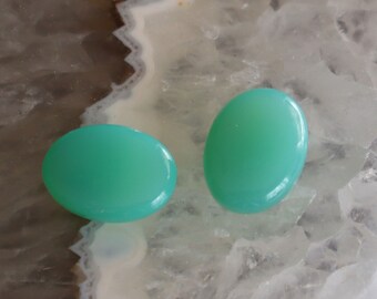 2 pieces chrysoprase cabachons  great color 10 x 14mm