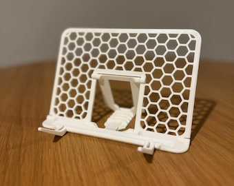 Phone and tablet stand, collapsible stand for easy storage. Travel friendly stand.