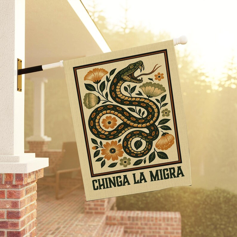 May include: A rectangular beige flag with a black border features a green snake with an open mouth and a long tongue, surrounded by orange and green flowers. The text "CHINGA LA MIGRA" is at the bottom.