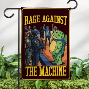 May include: A garden flag with the text "RAGE AGAINST THE MACHINE" in yellow. The flag features a cartoon illustration of a frog facing police officers and protesters. The frog is green with a blue scarf. The background is maroon.