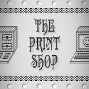 May include: A silver metal sign with the text "THE PRINT SHOP" in a stylized font. Two black and white pixelated images of computers with smiley faces on the screens are on either side of the text.