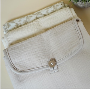 Portable Baby Changing Pad Beige Diaper Mat Travel Essential New Mom Gift Idea Neutral Nursery Muslin Cotton Foldable Design Compact Storage