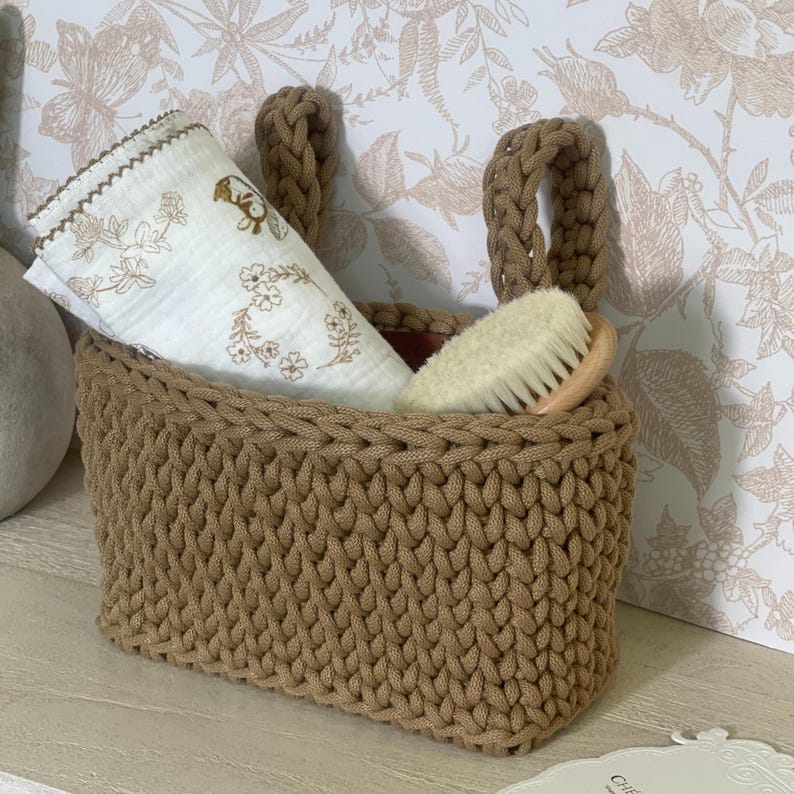 Nursery Storage Solution Knit Crib Organizer Hanging Design Basket Handmade Baby Caddy Diaper Station Accessory Bedside Essential Holder Organic Cotton Material Textured Yarn Construction Vintage Inspired Pattern Durable Structure Soft