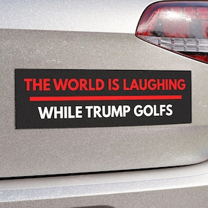 The World is Laughing Car Magnet 10x3 Political Anti Republican Bumper Sticker Support Democrats Traitor Trump Anti Maga Anti GOP Anti Trump