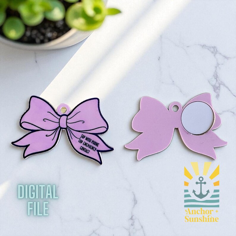 May include: Two lavender bow-shaped tags. One bow has a black outline and text that reads "TAP WITH PHONE FOR EMERGENCY CONTACT." The other bow has a white circle. The words "DIGITAL FILE" are at the bottom left.