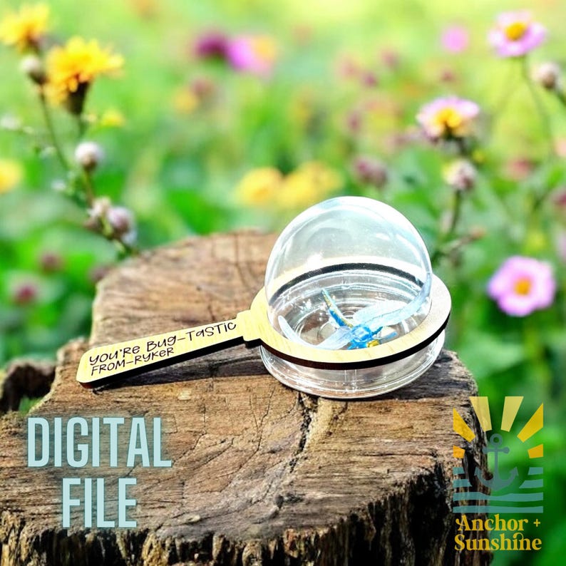 May include: A wooden magnifying glass with a clear plastic dome, containing a blue dragonfly. The handle is engraved with the text "You're Bug-Tastic From Ryker".