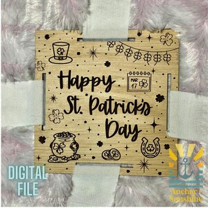 May include: A wooden sign with the text "Happy St. Patrick's Day" in a decorative font. The sign is decorated with shamrocks, a pot of gold, and a horseshoe.