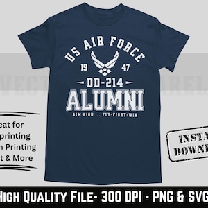 May include: Navy blue t-shirt with a white graphic. The graphic includes the text "US AIR FORCE" above a stylized emblem, the years "19" and "47", and the text "DD-214 ALUMNI". The phrase "AIM HIGH... FLY-FIGHT-WIN" is below.