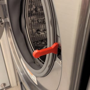 Soporte magnético para puerta de lavandería