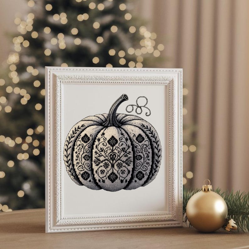 Framed pumpkin artwork displayed as elegant halloween xstitch wall decor.