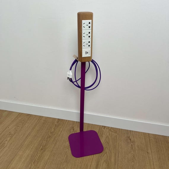 A handcrafted ash wood power station with integrated USB-C hub — where a carpenter and a tech nerd collaborated on the most beautiful power strip you've ever seen.