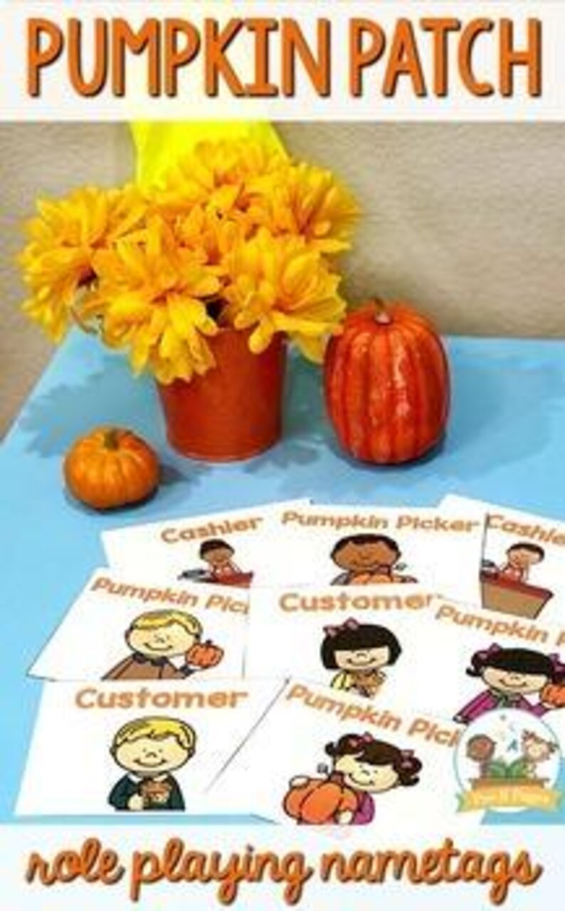 May include: An orange pumpkin and a smaller pumpkin sit on a blue surface next to a vase of yellow flowers. Several role-playing nametags with the text "Pumpkin Picker" and "Cashier" are displayed. The words "PUMPKIN PATCH" are at the top.