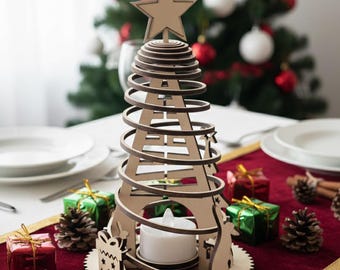 May include: A wooden Christmas tree-shaped candle holder with a star on top. The candle holder has a spiral design and sits on a round base. A white candle is inside. The scene includes gifts, pinecones, and a Christmas tree in the background.