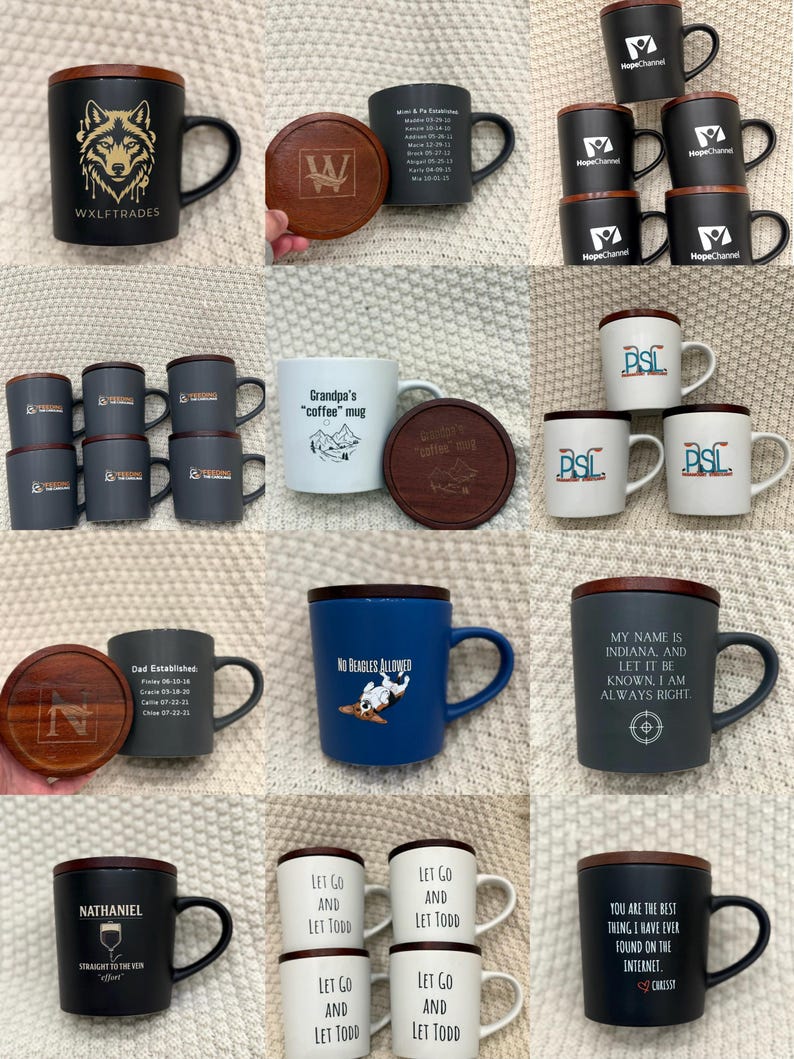 May include: A collection of ceramic mugs with various designs and text. Some mugs are black, white, or blue, with wooden lids. Designs include a wolf, text, and graphic illustrations. The mugs are suitable for beverages.