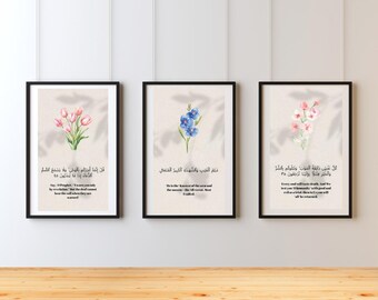 May include: Three printable wall art prints featuring watercolour floral illustrations and Arabic calligraphy. The prints are framed in black frames and have a white background.