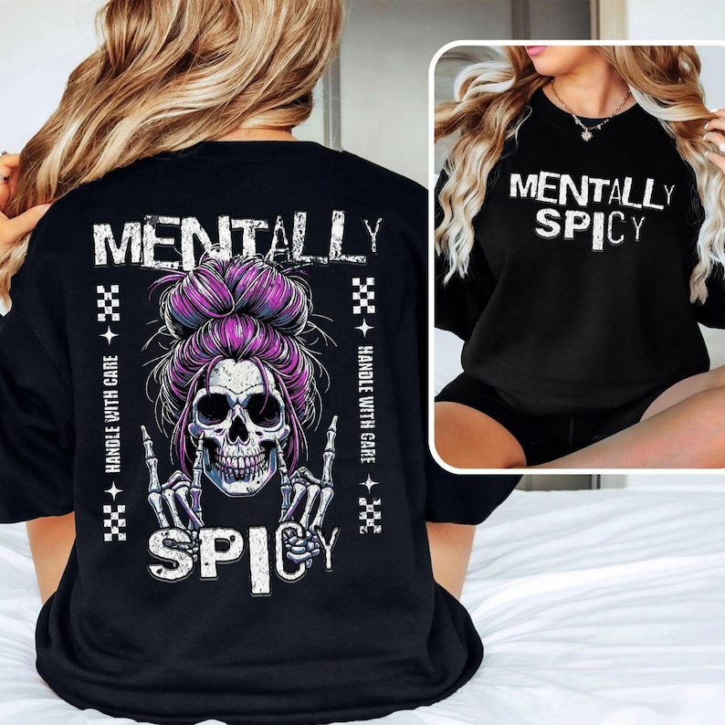 a woman wearing a black t-shirt with a graphic design of a skull wearing a purple bun and the text "Mentally Spicy" printed on it.