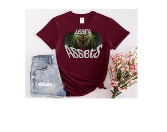 Funny Monstera Leaf T-Shirt: "Leafy Assets" Sarcastic Graphic Tee