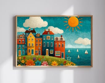 May include: A framed art print showing a coastal village. The image features colourful houses in yellow, orange, and red, set on a green hill. A bright sun and sailboats are on the blue sea, with white clouds in the sky.