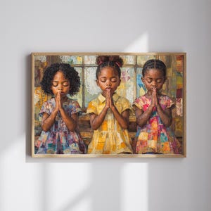 May include: A framed artwork featuring three young girls with their hands clasped in prayer. Each girl wears a colorful dress, with the middle girl in a yellow dress. The background includes a window with lace curtains and a muted color palette.