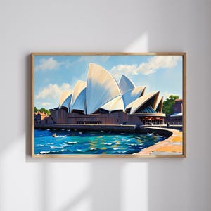 Peut inclure: Une peinture représentant l'Opéra de Sydney, un monument célèbre en Australie. Le bâtiment est blanc avec un design unique et est situé sur le front de mer. L'eau est bleue et il y a des bateaux au loin.