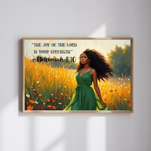 May include: A framed art print featuring a woman in a green dress walking through a field of wildflowers. The text "THE JOY OF THE LORD IS YOUR STRENGTH" - Nehemiah 8:10 is displayed at the top. The artwork has a warm, golden color palette.