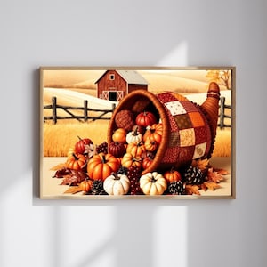 Pode incluir: Uma impressão emoldurada com uma cornucópia transbordando de abóboras, cabaças e pinhas. A cornucópia tem um design de patchwork. O fundo mostra um celeiro e uma cerca em um campo de trigo dourado, evocando um tema de colheita.