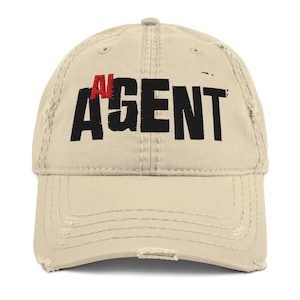 May include: A beige distressed baseball cap with black embroidered text that reads "AI AGENT" in red and black.