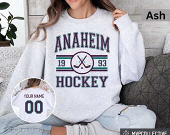 Bluza hokejowa Anaheim w stylu retro - Vintage Anaheim Ducks z okrągłym dekoltem - Modna koszulka Anaheim - Spersonalizowana bluza hokejowa Ducks