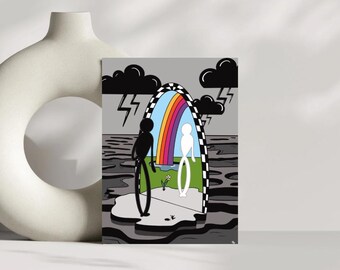May include: A framed art print featuring a surreal illustration. A black figure stands before a checkered archway with a rainbow, while a white figure stands within. Dark clouds and lightning contrast with the colorful archway.