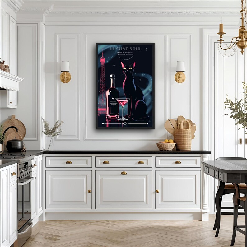 May include: A framed art print featuring a black cat, a bottle, and a martini glass. The artwork has a dark background with the Eiffel Tower and the words "LE CHAT NOIR FRENCH LIQUEUR". The cat has yellow eyes and is sitting upright.