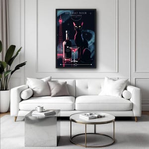 May include: A framed art print featuring a black cat, a bottle, and a martini glass. The Eiffel Tower is in the background. The text "LE CHAT NOIR FRENCH LIQUEUR" is at the top. The artwork has a dark, neon color scheme.