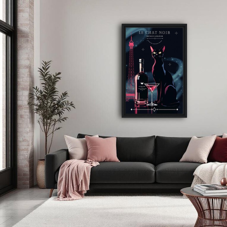May include: A framed art print featuring a black cat, a bottle, and a cocktail glass. The artwork has a dark blue background with the Eiffel Tower and the text "LE CHAT NOIR FRENCH LIQUEUR". The cat has yellow eyes.