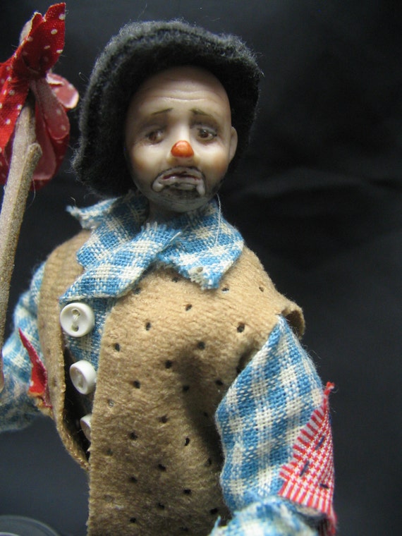 porcelain hobo clown doll