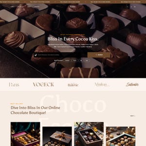May include: Website homepage featuring a variety of chocolates in a dark box. The text "Bliss In Every Cocoa Kiss" is displayed prominently. The website also features a search bar and various product categories.
