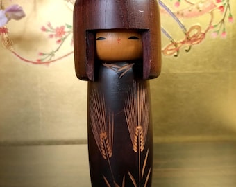 Vintage Usaburo Kokeshi Doll: Handcrafted Dark Wood Wheat Motif, Japanese Folk Art