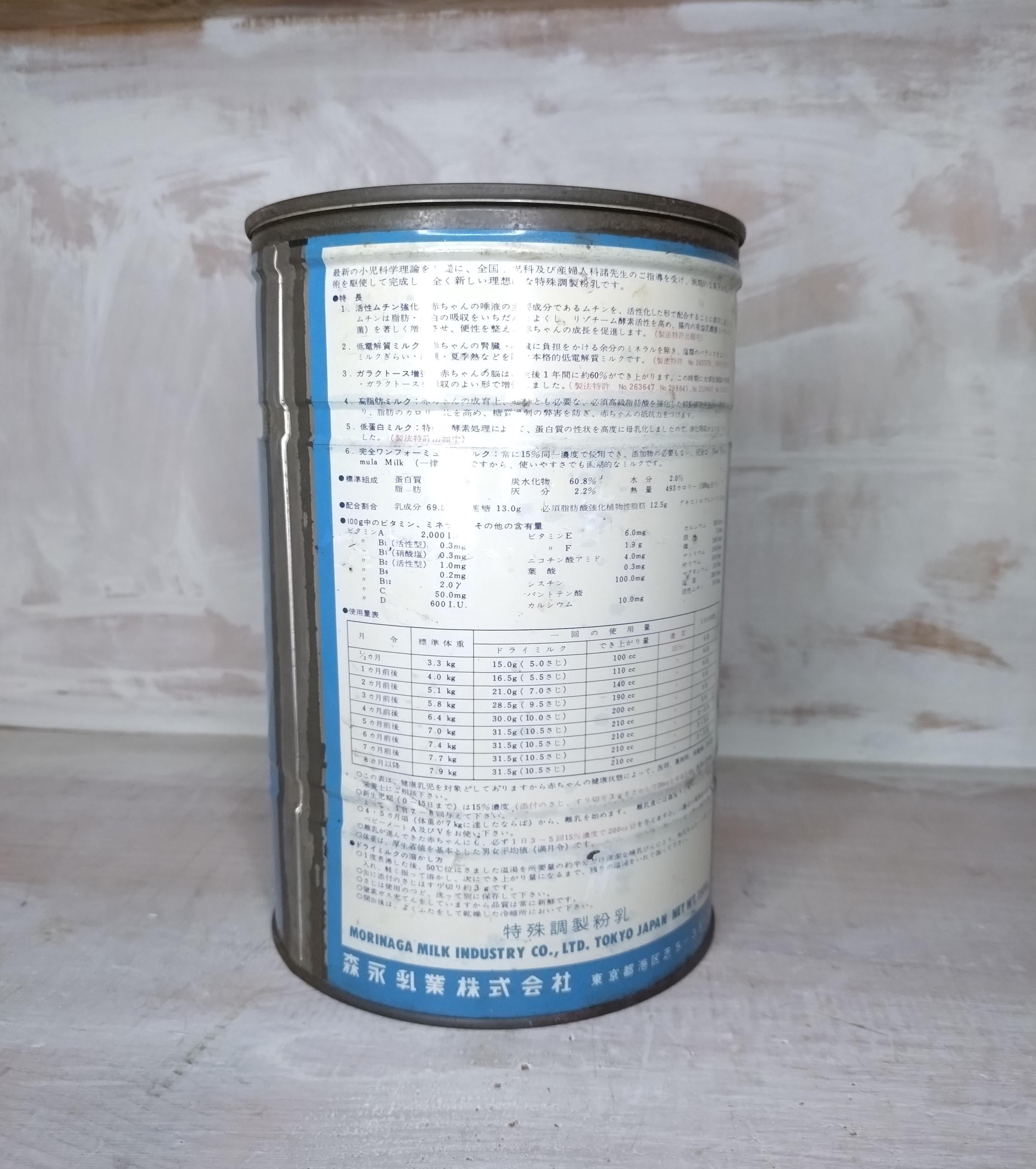1950年代のヴィンテージ森永ドライミルク缶 – レトロな牛柄の日本製缶 