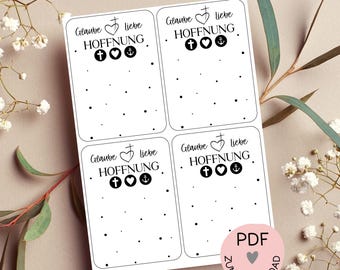 May include: Four printable cards with a black and white design. Each card features the text "Glaube Liebe Hoffnung" with a cross, heart, and anchor symbol. The cards are designed for use as earring display cards.