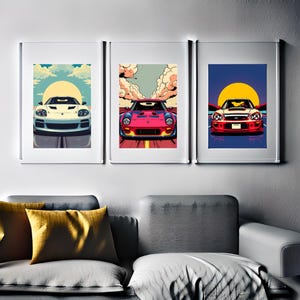 May include: Three framed prints of colorful illustrations of cars. Each print features a different car in a different color and setting. The cars are a white car, a pink car, and a red car.