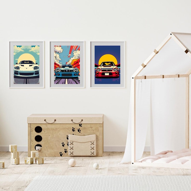 May include: Three framed prints of colorful illustrations of cars. Each print features a different car with a sunset background. The prints are displayed on a white wall above a wooden storage box.