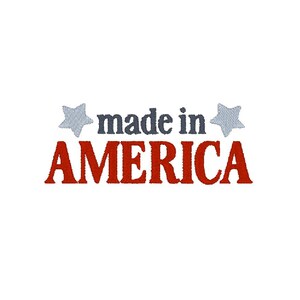 May include: White background with the text "made in AMERICA" in red and dark gray. Two light blue stars flank the words. The text is in a stitched embroidery style.