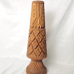 May include: A set of three ceramic mugs with a speckled, matte finish. The mugs are in shades of cream, light gray, and dark gray. Each mug has a simple, minimalist design, perfect for coffee or tea.