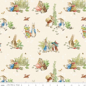 May include: A cream-colored fabric featuring a repeating pattern of watercolor illustrations. The design includes rabbits in various poses, butterflies, flowers, and greenery. The illustrations are in soft pastel colors, creating a whimsical and charming aesthetic.