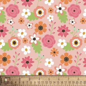 May include: A floral fabric featuring a repeating pattern of pink, orange, and white flowers with green leaves on a light pink background. The ruler at the bottom measures up to 8 inches.